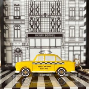 Henri Bendel Yellow Taxi Keychain- does not shine light.